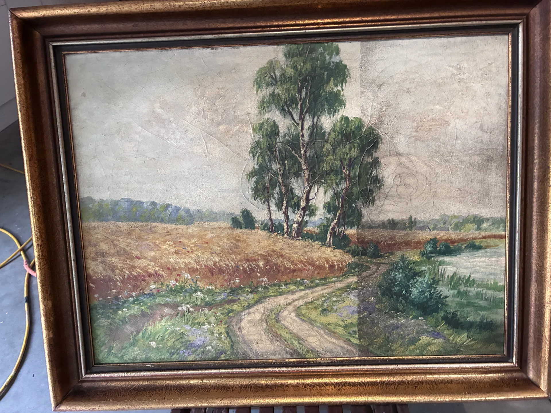 Laser usuwa werniks z powierzchni obrazu